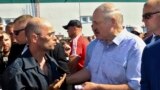 BELARUS -- Belarusian President Alyaksandr Lukashenka, second right, argues with a worker of the Minsk Wheel Tractor Plant in Minsk, August 17, 2020