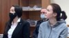 RUSSIA -- Kira Yarmysh (right), the press secretary of opposition politician Aleksei Navalny, attends a court hearing in Moscow, February 1, 2021