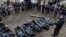 UKRAINE – The bodies of five men found in the basement of a children's sanatorium in the city of Bucha after the Russian military left the city on March 31. Bucha, Kyiv region, April 4, 2022