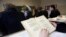 latvia -- A Russian-speaking student reads from a textbook during a Russian literature lesson in a school in Riga February 15, 2012