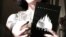 UKRAINE--Women with first issue of "Moloko plus" magazine