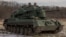 Ukrainian crew members sit in a German Gepard anti-aircraft-gun tank that is used to target Russian launched drones, during the vehicle's demonstration to the media, in the outskirts of Kyiv, on November 30, 2023, amid the Russian invasion of Ukraine.
