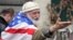 A Georgian demonstrator, known for his affinity for the U.S. flag, attends a 2014 anti-Russia rally in Tbilisi, Georgia.
