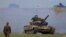Tanks during a military command-staff exercise by a joint Russian-Tajik force at Kharbmaidon