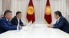 President Sooronbai Jeenbekov (right) meets with Kyrgyzstan's new parliamentary speaker, Kanat Isaev (front left), and prime minister, Sadyr Japarov, in Bishkek on October 14, 2020.