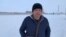 Kazakhstan -- Civil activist Dulat Agadil near the temporary holding facility after being released from custody. Akmol village, Tselinograd district of Akmola region. 26Nov2019.