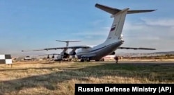 Russian military planes with peacekeeper-soldiers on board are seen after landing at Erebuni Airport outside Yerevan, Armenia on November 10, 2020.