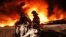 Russia -- Firefighters extinguish fire at a warehouse containing plastic materials on fire in Moscow, September 23, 2016