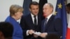 Ангела Меркель, Эммануэль Макрон и Владимир Путин в Елисейском дворце в Париже после саммита по Украине, 9 декабря 2019 года 