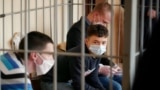 Никита Золотарев, Дмитрий Корнеев и Леонид Ковалев на заседании суда в Гомеле 
