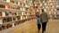 In this Monday, Feb. 9, 2009 file photo, Benjamin Zucker, an author and precious stones specialist, and his grandson Abram Goren, 8, visit The Valmadonna Library Trust collection on display at Sotheby's in New York