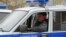 A police officer in a new UAZ Hunter 