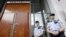 Norway -- Police officers guard the court entrance  in Oslo, Norway, Monday, July 25, 2011