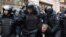 Russia -- Russian police officers detain a man in central Moscow, April 2, 2017
