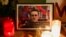 People attend a vigil following the death of Russian opposition leader Alexei Navalny, in Paris