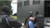 Кадр из репортажа белорусского государственного телеканала о задержании наемников в санатории под Минском 29 июля 2020 года