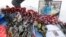 RUSSIA -- Red carnations are placed near a portrait of a Russian pilot Roman Filipov, who was shot down in Syria, in front of the Russian Defense Ministry in Moscow, Russia, 06 February 2018.