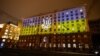 UKRAINE – The building of the Kyiv City State Administration and the Kyiv City Council is illuminated with the colors of the state flag and the image of the coat of arms of Ukraine on the Day of Unity. Kyiv, February 16, 2022