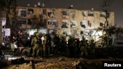 Последствия обстрела города Димона в Израиле