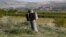 NAGORNO-KARABAKH -- The remains of a rocket shell are seen after recent shelling during the military conflict over the breakaway region of Nagorno-Karabakh, in the town of Martuni, October 14, 2020