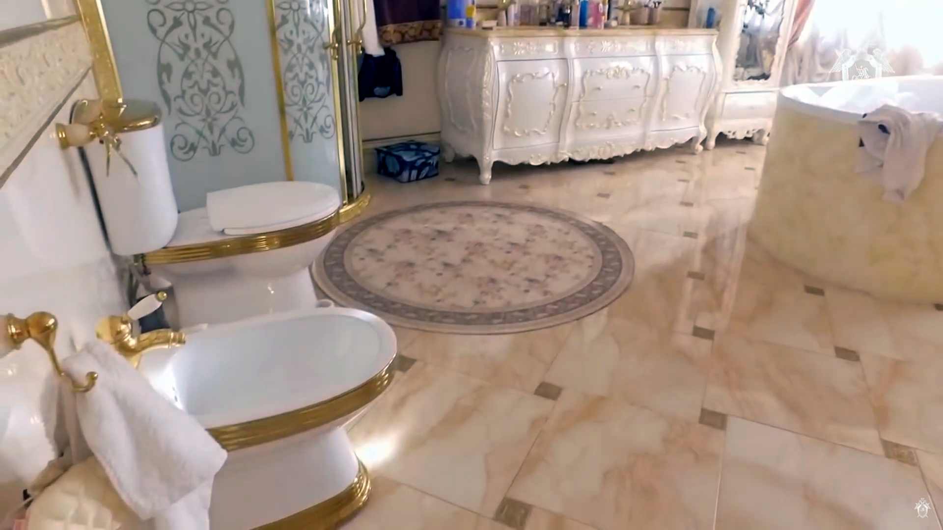 This toilet and bidet with gold trim were spotted where?