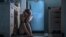 young depressed and overwhelmed woman desperate at home kitchen floor feeling sad and scared suffering depression and anxiety problem in domestic violence and abused victim concept