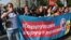 RUSSIA -- Protesters shout slogans as they hold a poster reading "Corruption steal pensions!" during a rally in Moscow, September 9, 2018