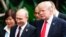 VIETNAM -- U.S. President Donald Trump (R) and Russian President Vladimir Putin talk during the group photo session at the APEC Summit in Danang, Nov. 11, 2017