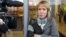 Russia -- Open Russia employee Maria Baronova speaks to journalists in f ront of an office building, which houses the premises of Kremlin critic Mikhail Khodorkovsky's Open Russia movement, during a police raid, Moscow, April 27, 2017