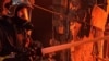 This handout picture taken and released by the Ukrainian State Emergency Service on July 6, 2025 shows firefighters extinguishing a fire in an industrial and housing sector following a Russian drone attack in Vyshgorod district, Kyiv region, amid the Russ