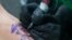 Belarus - Woman doing tattoos in national Belarusian style. Hrodno, 11Jan2018
