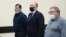 RUSSIA -- (L-R) Dmitry Grishin, former governor of the Ivanovo region, auditor of the Account Chamber Mikhail Men and former governor of the Ivanovo region Pavel Konkov attenda court hearing in Moscow, March 22, 2021