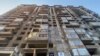 В Душанбе люди живут в недоделанных квартирах: их строила компания сына главы Службы связи