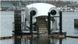 Mr Wheel automatic ship that collects garbage in Baltimore USA 