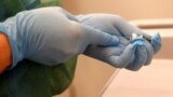 LATVIA - Medical worker prepres Pfizer/BioNTech COVID-19 vaccine as Latvia begins vaccinations against the coronavirus disease (COVID-19), at the hospital in Ventspils, Latvia December 28, 2020