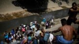Вода – в реке, больница – в Колумбии. Парламент ввел в Венесуэле чрезвычайное положение