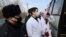 RUSSIA -- Alliance of Doctors medical trade union activists are detained by police officers after demonstrating at the entrance to the penal colony N2, where Kremlin critic Aleksei Navalny has been transferred to serve a two-and-a-half year prison term fo