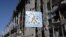 UKRAINE – A bullet-ridden road sign is seen in front of the destroyed Donetsk international airport, October 13, 2015