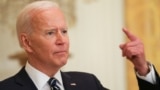 U.S. -- U.S. President Joe Biden gestures as he answers a question during his first formal news conference as president in the East Room of the White House in Washington, March 25, 2021