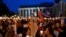 Poland -- People hold candles and Polish national flags as they take part in a demonstration in front of the Polish Supreme Court in Warsaw, July 23, 2017