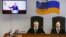 UKRAINE -- Ukrainian President Petro Poroshenko is seen on an electronic screen as he testifies via a video link during the trial against former President Viktor Yanukovych, who was accused of high treason, inside a court building in Kyiv, February 21, 20