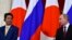 RUSSIA -- Russian President Vladimir Putin and Japanese Prime Minister Shinzo Abe give a joint press statement following their meeting at the Kremlin in Moscow, January 22, 2019