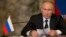 EGYPT -- Russian President Vladimir Putin speaks during a press conference with Egyptian President following their talks in Cairo, December 11, 2017