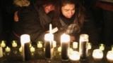 CANADA -- Mourners attend an outdoor vigil for the victims of a Ukrainian passenger jet which crashed in Iran, in Toronto, Ontario, Canada January 9, 2020. 