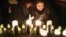 CANADA -- Mourners attend an outdoor vigil for the victims of a Ukrainian passenger jet which crashed in Iran, in Toronto, Ontario, Canada January 9, 2020.
