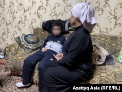 Шахноза со своим сыном Хотамджоном