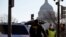 Washington, U.S. - Police enforcements arrive to guard the U.S. Capitol, a day after supporters of U.S. President Donald Trump occupied the U.S. Capitol Building