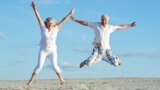 loving mature couple on a background of clear sky