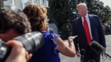President Donald Trump takes questions from reporters