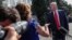 President Donald Trump takes questions from reporters